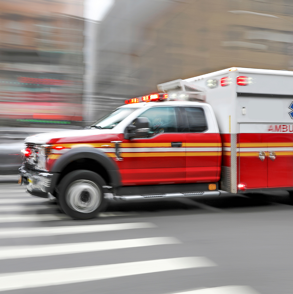 Ambulance,on,emergency,car,in,motion,blur